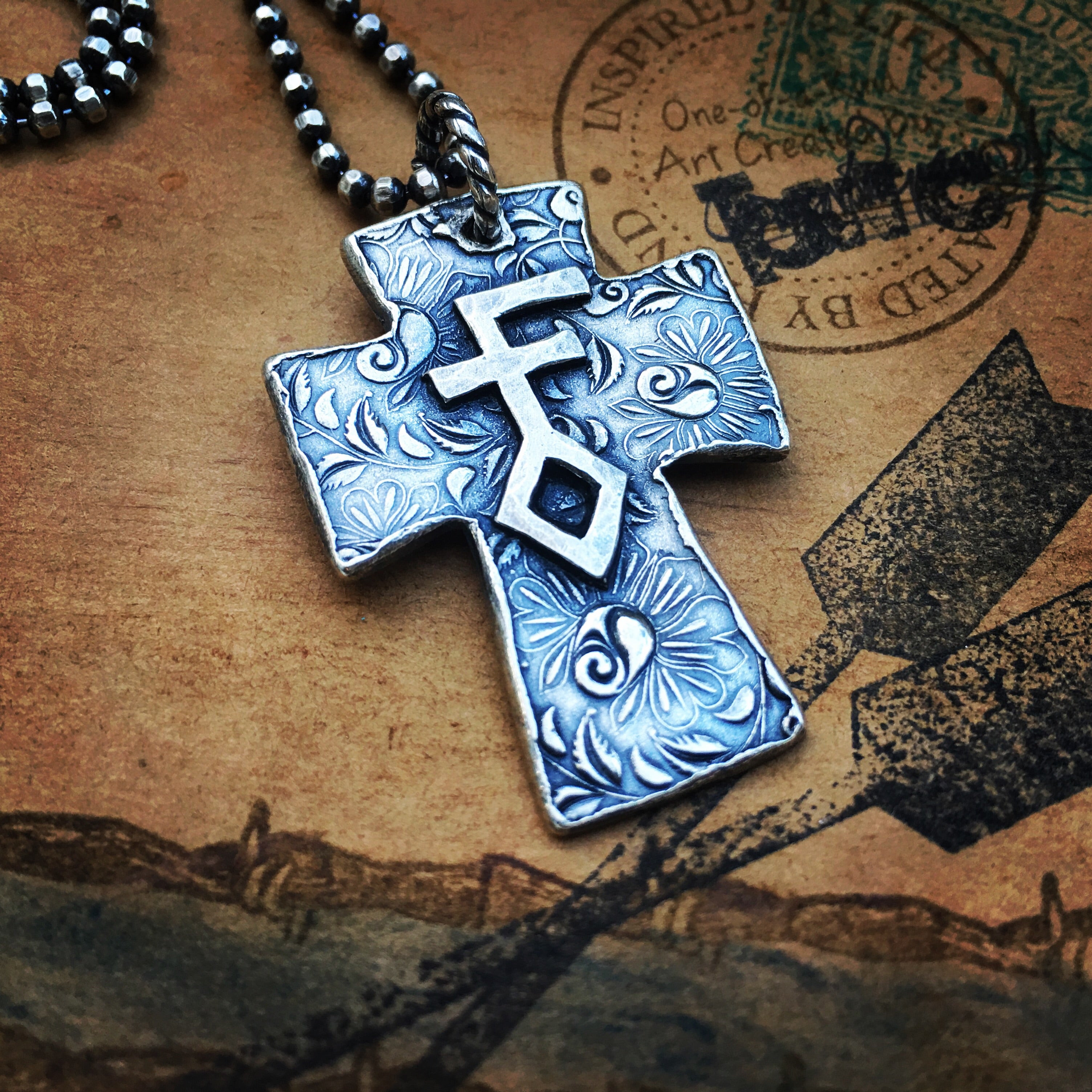 1.5” sterling cross with or without the turquoise